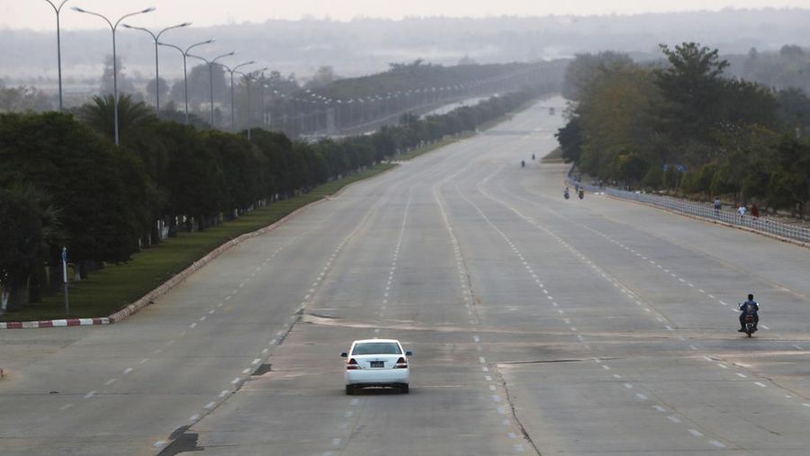 Vehicles make their ways on a road in Naypyitaw, Myanmar, Monday, Feb. 1, 2021. Myanmar military television said Monday that the military was taking control of the country for one year, while reports said many of the country's senior politicians including Aung San Suu Kyi had been detained. (AP Photo)