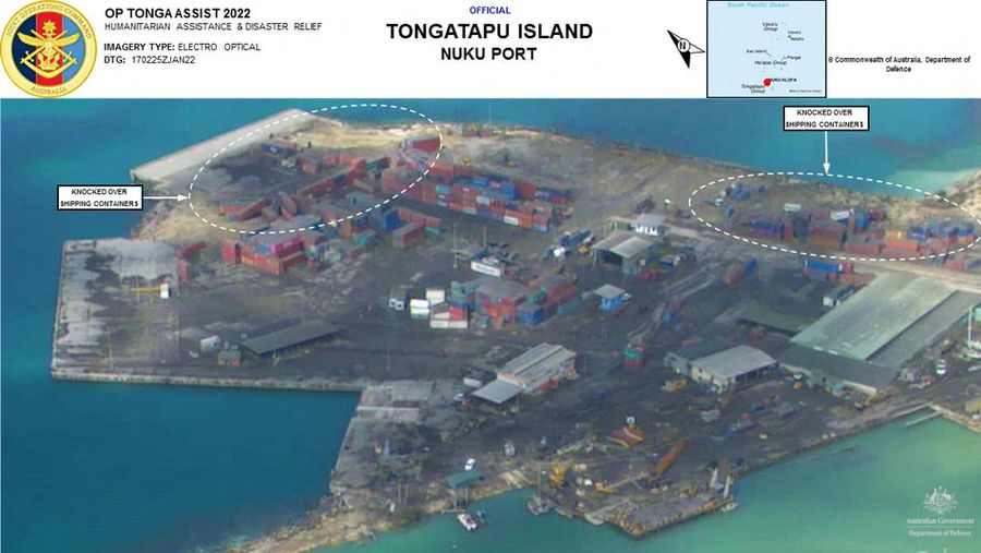 A general view from a New Zealand Defence Force P-3K2 Orion surveillance flight shows heavy ash fall over Nomuka in Tonga after the Pacific island nation was hit by a tsunami triggered by an undersea volcanic eruption January 17, 2022. Picture taken January 17, 2022. New Zealand Defence Force/Handout via REUTERS ATTENTION EDITORS - THIS IMAGE WAS PROVIDED BY A THIRD PARTY. NO RESALES. NO ARCHIVE.