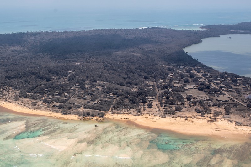 TONGA-VOLCANO/ A general view from a New Zealand Defence Force P-3K2 Orion surveillance flight shows heavy ash fall over Nomuka in Tonga after the Pacific island nation was hit by a tsunami triggered by an undersea volcanic eruption January 17, 2022. Picture taken January 17, 2022. New Zealand Defence Force/Handout via REUTERS ATTENTION EDITORS - THIS IMAGE WAS PROVIDED BY A THIRD PARTY. NO RESALES. NO ARCHIVE.
