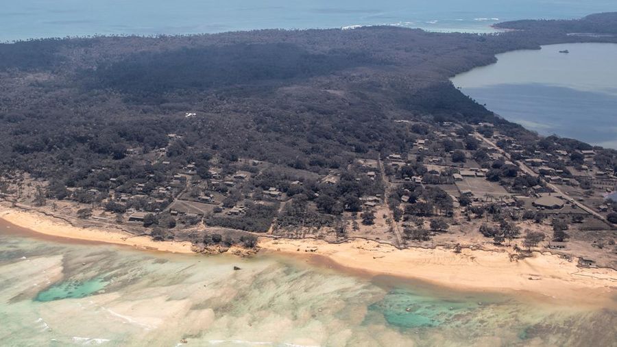 A general view from a New Zealand Defence Force P-3K2 Orion surveillance flight shows heavy ash fall over Nomuka in Tonga after the Pacific island nation was hit by a tsunami triggered by an undersea volcanic eruption January 17, 2022. Picture taken January 17, 2022. New Zealand Defence Force/Handout via REUTERS ATTENTION EDITORS - THIS IMAGE WAS PROVIDED BY A THIRD PARTY. NO RESALES. NO ARCHIVE.