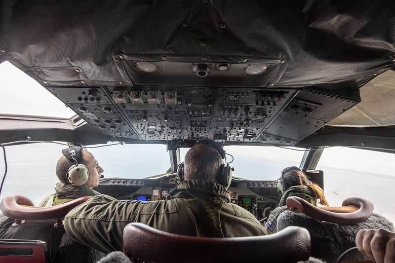 A general view from a New Zealand Defence Force P-3K2 Orion surveillance flight shows heavy ash fall over Nomuka in Tonga after the Pacific island nation was hit by a tsunami triggered by an undersea volcanic eruption January 17, 2022. Picture taken January 17, 2022. New Zealand Defence Force/Handout via REUTERS ATTENTION EDITORS - THIS IMAGE WAS PROVIDED BY A THIRD PARTY. NO RESALES. NO ARCHIVE.