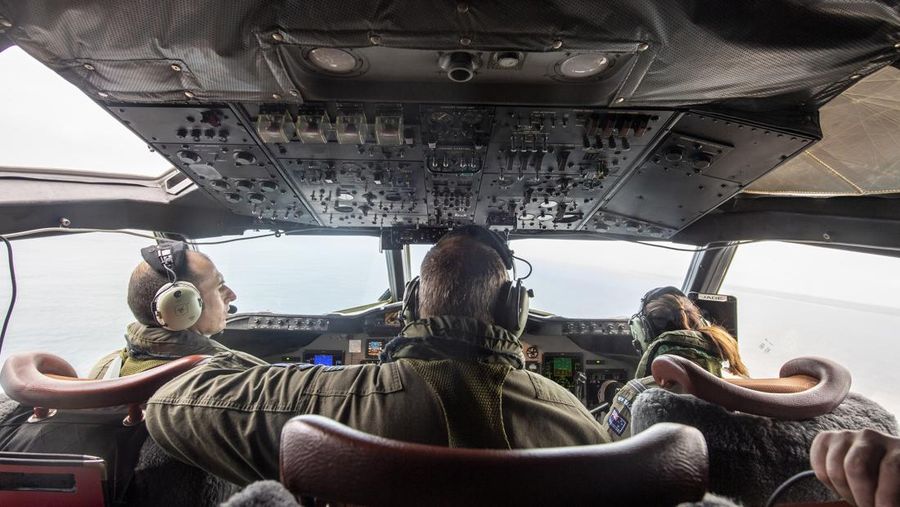 A general view from a New Zealand Defence Force P-3K2 Orion surveillance flight shows heavy ash fall over Nomuka in Tonga after the Pacific island nation was hit by a tsunami triggered by an undersea volcanic eruption January 17, 2022. Picture taken January 17, 2022. New Zealand Defence Force/Handout via REUTERS ATTENTION EDITORS - THIS IMAGE WAS PROVIDED BY A THIRD PARTY. NO RESALES. NO ARCHIVE.