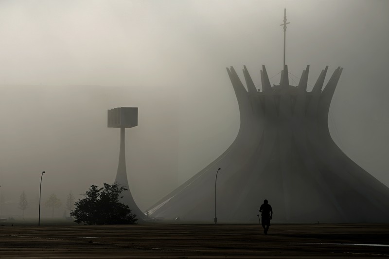 FILE - In this Wednesday, Jan. 25, 2017 file photo, residents walk in a street in Astana, Kazakhstan. The parliament of the Central Asian nation of Kazakhstan on Wednesday March 20, 2019, voted to rename the country's capital Nursultan, after the outgoing longtime leader. (AP Photo/Sergei Grits, File)