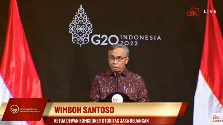 Ketua Dewan Komisioner Otoritas Jasa Keuangan (OJK) Wimboh Santoso Saat Pertemuan Tahunan Industri Jasa Keuangan 2022 dan Peluncuran Taksonomi Hijau Indonesia Ketua Dewan Komisioner Otoritas Jasa Keuangan (OJK) Wimboh Santoso Saat Pertemuan Tahunan Industri Jasa Keuangan 2022 dan Peluncuran Taksonomi Hijau Indonesia (Tangkapan Layar Youtube Jasa Keuangan)