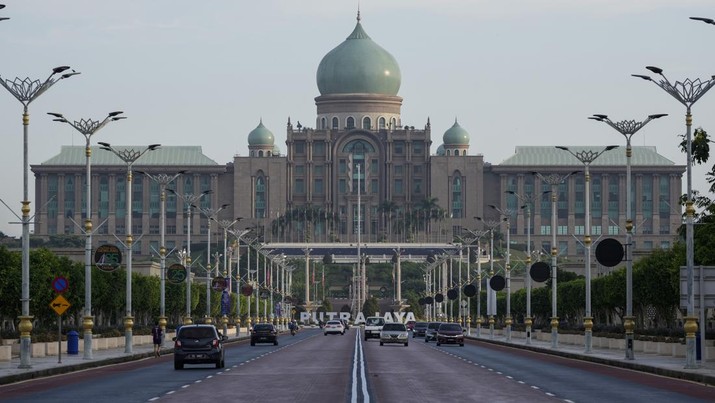 Malaysia Southeast Asia Hacking Morning traffic moves in front of the main building of the Malaysia Prime Minister's office is seen in Putrajaya, Malaysia, Wednesday, Dec. 8, 2021. Chinese hackers, likely state-sponsored, have been broadly targeting government and private-sector organizations across Southeast Asia, including Malaysia, according to a report released Wednesday by a U.S.-based private cybersecurity company. (AP Photo/Vincent Thian)