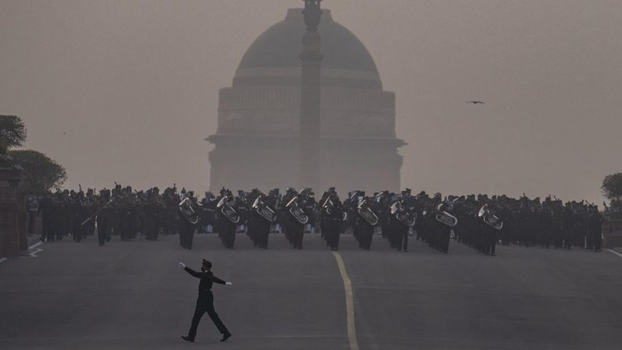 An all women team from Indian Border Security force displays their skill on a moving motorcycle during the rehearsal for the upcoming Republic Day parade at the Raisina hills, the government seat of power, in New Delhi, India, Thursday, Jan. 20, 2022. India celebrates Republic Day on Jan. 26, highlighted by a march past by different branches of the military as well as a display of arms and missiles. (AP Photo/Manish Swarup)