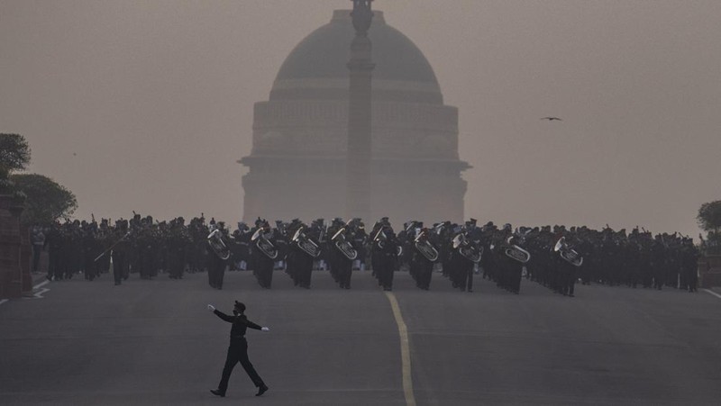 An all women team from Indian Border Security force displays their skill on a moving motorcycle during the rehearsal for the upcoming Republic Day parade at the Raisina hills, the government seat of power, in New Delhi, India, Thursday, Jan. 20, 2022. India celebrates Republic Day on Jan. 26, highlighted by a march past by different branches of the military as well as a display of arms and missiles. (AP Photo/Manish Swarup)