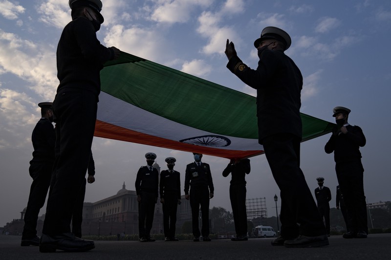 An all women team from Indian Border Security force displays their skill on a moving motorcycle during the rehearsal for the upcoming Republic Day parade at the Raisina hills, the government seat of power, in New Delhi, India, Thursday, Jan. 20, 2022. India celebrates Republic Day on Jan. 26, highlighted by a march past by different branches of the military as well as a display of arms and missiles. (AP Photo/Manish Swarup)