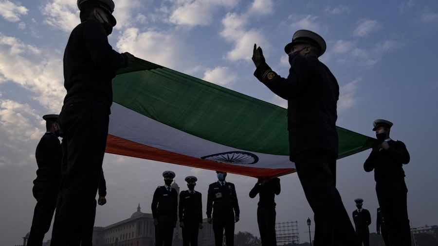 An all women team from Indian Border Security force displays their skill on a moving motorcycle during the rehearsal for the upcoming Republic Day parade at the Raisina hills, the government seat of power, in New Delhi, India, Thursday, Jan. 20, 2022. India celebrates Republic Day on Jan. 26, highlighted by a march past by different branches of the military as well as a display of arms and missiles. (AP Photo/Manish Swarup)