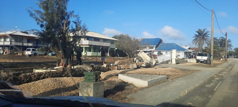 A general view shows damaged buildings following volcanic eruption and tsunami, in Tongatapu, Tonga in this picture obtained from social media on January 21, 2022. Courtesy of Marian Kupu/Broadcom Broadcasting FM87.5/via REUTERS THIS IMAGE HAS BEEN SUPPLIED BY A THIRD PARTY. MANDATORY CREDIT.