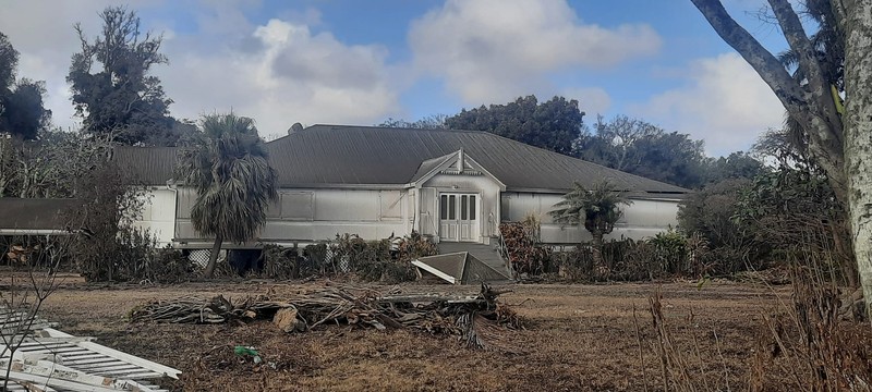 A general view shows damaged buildings following volcanic eruption and tsunami, in Tongatapu, Tonga in this picture obtained from social media on January 21, 2022. Courtesy of Marian Kupu/Broadcom Broadcasting FM87.5/via REUTERS THIS IMAGE HAS BEEN SUPPLIED BY A THIRD PARTY. MANDATORY CREDIT.