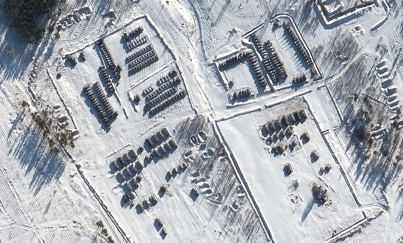This satellite image provided by Maxar Technologies shows battle group deployments at the Pogonovo training area in Voronezh, Russia, Wednesday, Jan. 19, 2022. President Joe Biden said Wednesday, Jan. 19, he thinks Russia will invade Ukraine and warned President Vladimir Putin that his country would pay a “dear price” in lives lost and a possible cutoff from the global banking system if it does. (Maxar Technologies via AP)