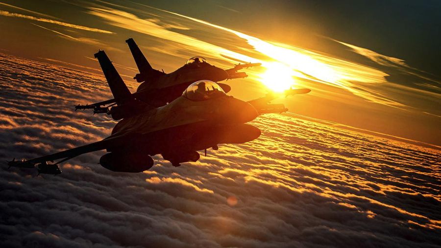 In this photo provided by Lithuanian Ministry of National Defense, Polish Air Force F-16 fighter jet participating in NATO's Baltic Air Policing Mission operate in Lithuanian airspace, Tuesday, Jan. 25, 2022. The NATO defence alliance on Monday said it was dispatching additional fighter jets and ships to Eastern Europe amid tensions with Russia. (Lithuanian Ministry of National Defense via AP)
