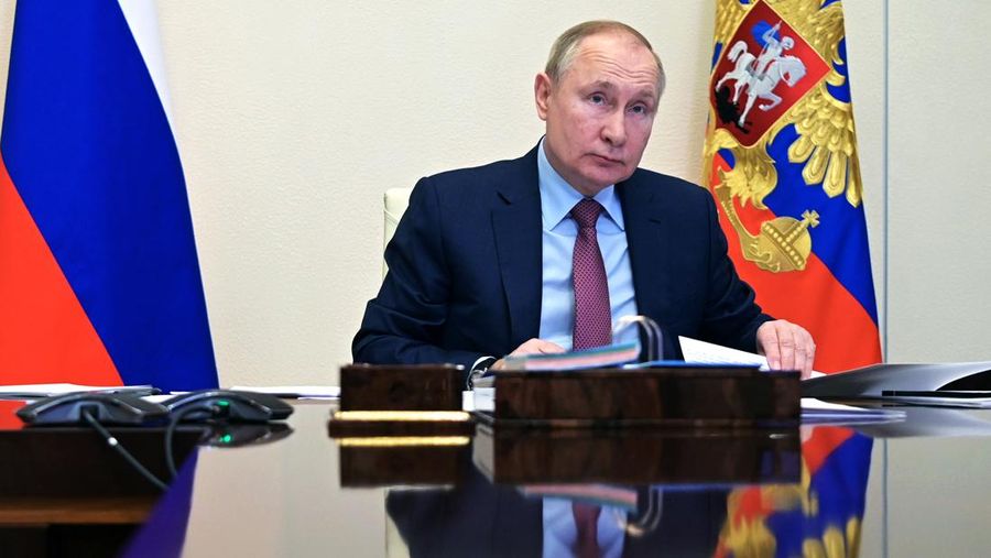Russian President Vladimir Putin chairs a meeting with Italian businessmen via videoconference at the Novo-Ogaryovo residence outside Moscow, Russia, Wednesday, Jan. 26, 2022. (Alexei Nikolsky, Sputnik, Kremlin Pool Photo via AP)