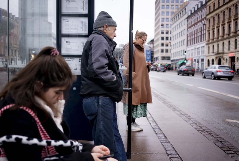 Workers walk over London Bridge towards the City of London financial district during the morning rush hour, in London, Monday, Jan. 24, 2022. The British government have asked people to return to working in offices starting Monday as they ease coronavirus restrictions. (AP Photo/Matt Dunham)