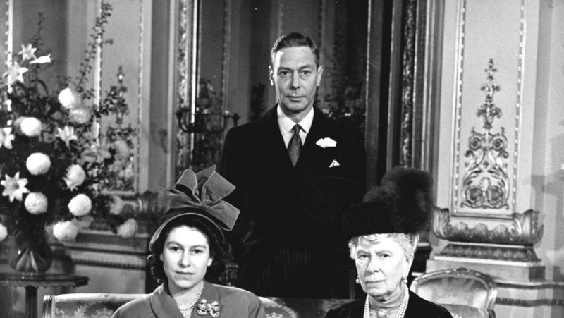Britain's Queen Elizabeth II looks at a display of memorabilia from her Golden and Platinum Jubilees in the Oak Room at Windsor Castle, Windsor, England, in this undated but recent image that was released on Friday Feb. 4, 2022. Queen Elizabeth II will mark 70 years on the throne Sunday Feb. 6, an unprecedented reign that has made her a symbol of stability as the United Kingdom navigated an age of uncertainty. (Steve Parsons/Pool via AP)