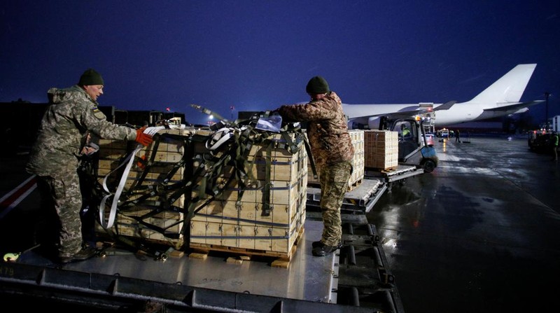 Military aid, delivered as part of the United States' security assistance to Ukraine, is unloaded from a plane at the Boryspil International Airport outside Kyiv, Ukraine, February 5, 2022. REUTERS/Valentyn Ogirenko