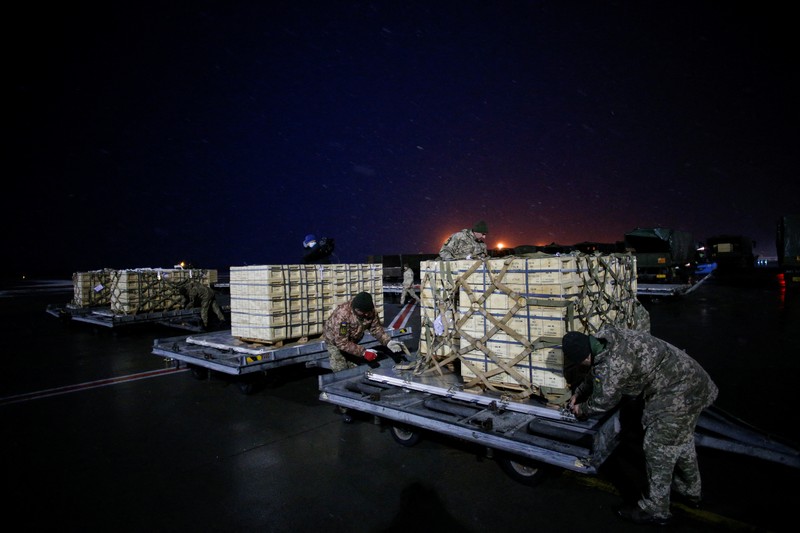 Military aid, delivered as part of the United States' security assistance to Ukraine, is unloaded from a plane at the Boryspil International Airport outside Kyiv, Ukraine, February 5, 2022. REUTERS/Valentyn Ogirenko