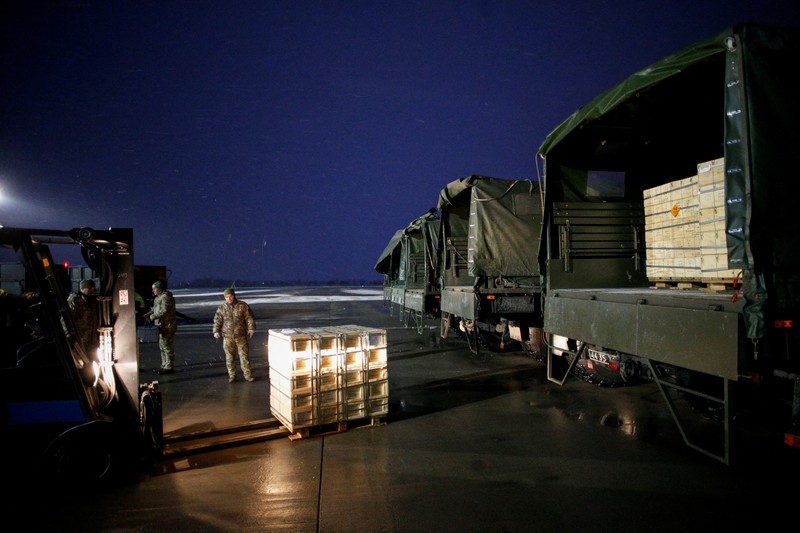 UKRAINE-CRISIS/US WEAPONS Military aid, delivered as part of the United States' security assistance to Ukraine, is unloaded from a plane at the Boryspil International Airport outside Kyiv, Ukraine, February 5, 2022. REUTERS/Valentyn Ogirenko