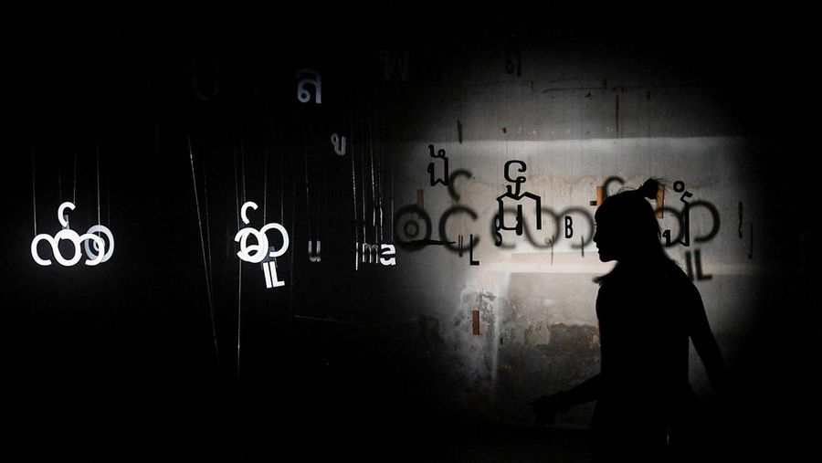 Local people visit a light installation exhibition to promote tourism at an abandoned New World department store in Bang Lamphu district, Bangkok Thailand February 6, 2022. REUTERS/Chalinee Thirasupa