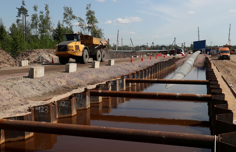 Ukraine Tensions Energy Explainer FILE - A tugboats get into position on the Russian pipe-laying vessel