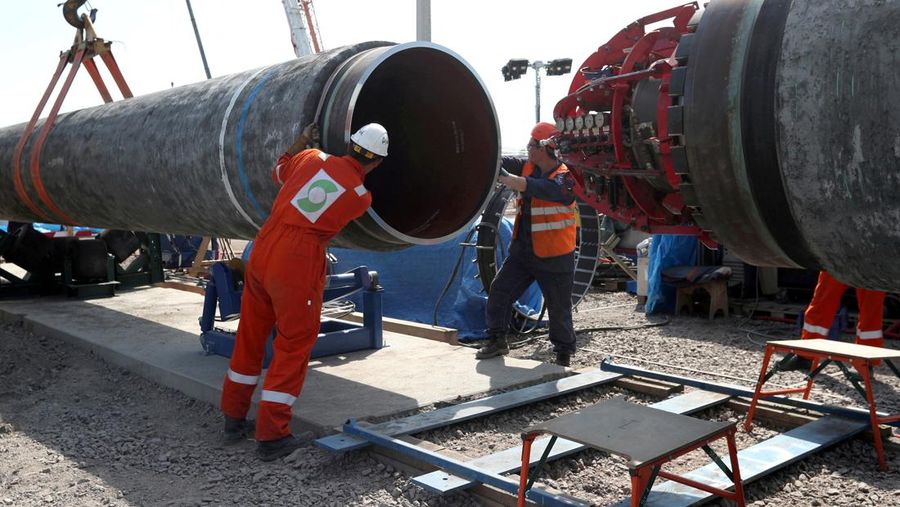 FILE PHOTO: Workers are seen at the construction site of the Nord Stream 2 gas pipeline, near the town of Kingisepp, Leningrad region, Russia, June 5, 2019. REUTERS/Anton Vaganov/File Photo