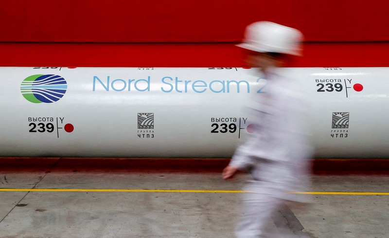 FILE - A tugboats get into position on the Russian pipe-laying vessel 