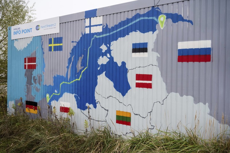 Ukraine Tensions Energy Explainer FILE - A tugboats get into position on the Russian pipe-laying vessel