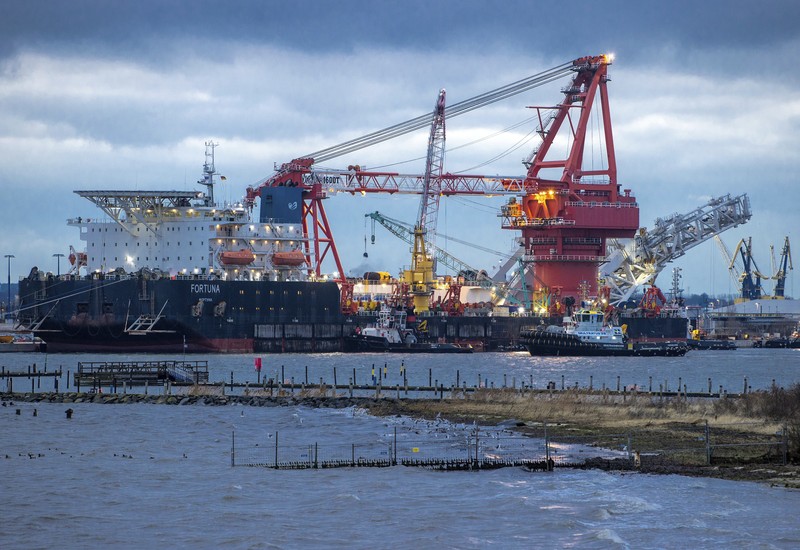 Ukraine Tensions Energy Explainer FILE - A tugboats get into position on the Russian pipe-laying vessel