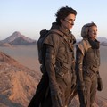 This image released by Warner Bros. Pictures shows Timothee Chalamet, left, and Rebecca Ferguson in a scene from "Dune." (Warner Bros. Pictures via AP)
