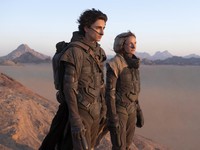This image released by Warner Bros. Pictures shows Timothee Chalamet, left, and Rebecca Ferguson in a scene from "Dune." (Warner Bros. Pictures via AP)