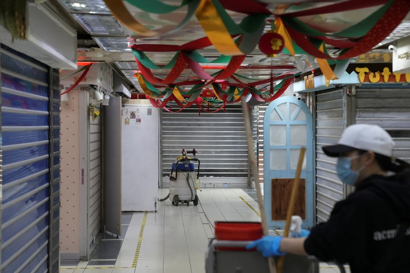 A pedestrian walks past the closed Kowloon Mosque and Islamic Centre, following the coronavirus disease (COVID-19) outbreak, in Hong Kong, China February 10, 2022. REUTERS/Lam Yik