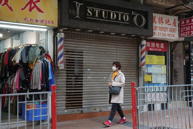 A pedestrian walks past the closed Kowloon Mosque and Islamic Centre, following the coronavirus disease (COVID-19) outbreak, in Hong Kong, China February 10, 2022. REUTERS/Lam Yik