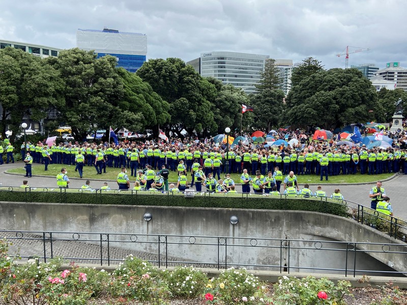 HEALTH-CORONAVIRUS/NEWZEALAND A vehicle with a picture of New Zealand's Prime Minister Jacinda Ardern is seen as Anti-vaccine mandate protesters gather to demonstrate in front of the parliament in Wellington, New Zealand, February 10, 2022. REUTERS/Praveen Menon