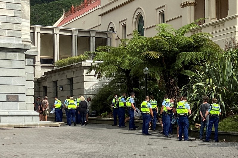 HEALTH-CORONAVIRUS/NEWZEALAND A vehicle with a picture of New Zealand's Prime Minister Jacinda Ardern is seen as Anti-vaccine mandate protesters gather to demonstrate in front of the parliament in Wellington, New Zealand, February 10, 2022. REUTERS/Praveen Menon