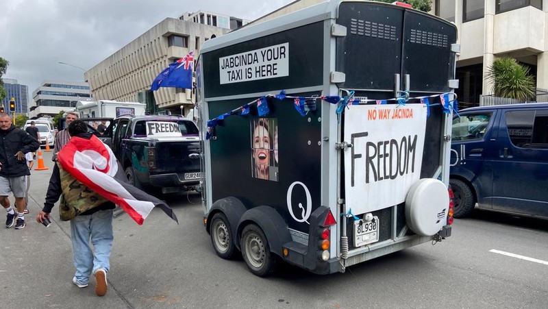A vehicle with a picture of New Zealand's Prime Minister Jacinda Ardern is seen as Anti-vaccine mandate protesters gather to demonstrate in front of the parliament in Wellington, New Zealand, February 10, 2022. REUTERS/Praveen Menon