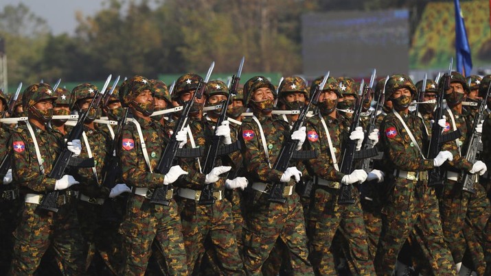 Soldiers march during a ceremony to mark Myanmar's 75th anniversary Union Day in Naypyitaw, Myanmar, Saturday, Feb. 12, 2022. The occasion is celebrated for the date in 1947 when many of the country's ethnic groups signed an agreement to unify following decades of British colonial rule, but it was ineffective, and efforts at unity remain failed. (AP Photo)