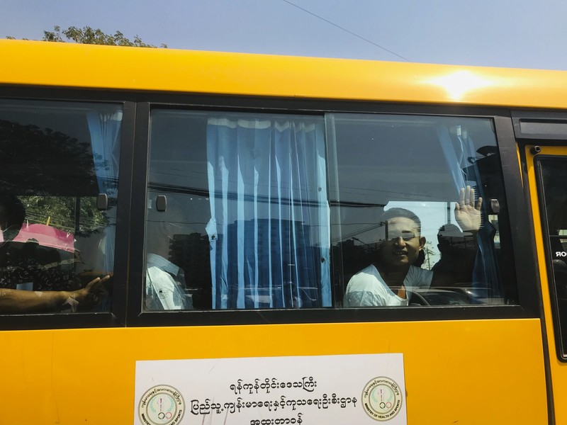 Myanmar Union Day A man gestures with his hands while onboard a bus with prisoners leaving Insein prison during the Union Day holiday in Yangon, Myanmar, Saturday, Feb. 12, 2022. In a customary gesture for national holidays, the head of Myanmar's military government, Senior General Min Aung Hlaing announced an amnesty Saturday covering more than 860 prisoners, state-run newspapers reported. (AP Photo)