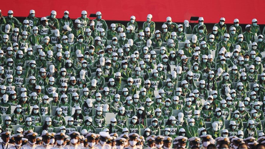State school students attend during a ceremony to mark Myanmar's 75th anniversary Union Day in Naypyitaw, Myanmar, Saturday, Feb. 12, 2022. The occasion is celebrated for the date in 1947 when many of the country's ethnic groups signed an agreement to unify following decades of British colonial rule, but it was ineffective, and efforts at unity remain failed. (AP Photo)