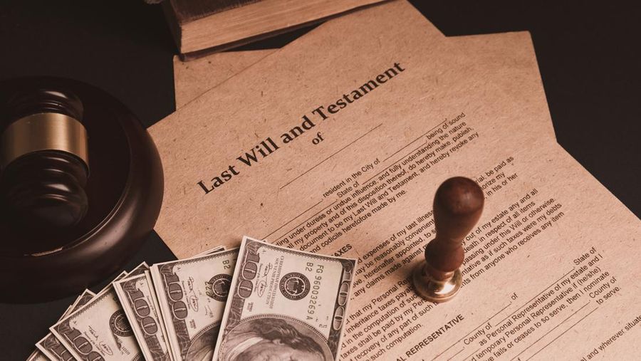 Notary's public pen and stamp on testament and last will. Notary public tools