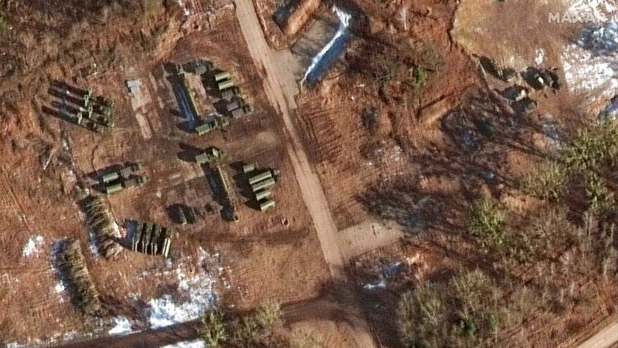 This Friday, Feb. 18, 2022 satellite imagery provided by Maxar Technologies shows a closer view of s400 air defense units at Luminets Airfield in Belarus. (Maxar Technologies via AP)