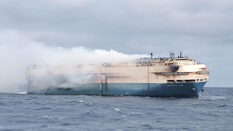 The ship, Felicity Ace, which was traveling from Emden, Germany, where Volkswagen has a factory, to Davisville, in the U.S. state of Rhode Island, burns more than 100 km from the Azores islands, Portugal, February 18, 2022. Portuguese Navy (Marinha Portuguesa)/Handout via REUTERS THIS IMAGE HAS BEEN SUPPLIED BY A THIRD PARTY.