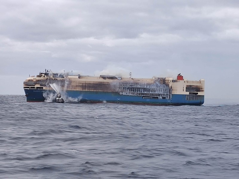 The ship, Felicity Ace, which was traveling from Emden, Germany, where Volkswagen has a factory, to Davisville, in the U.S. state of Rhode Island, burns more than 100 km from the Azores islands, Portugal, February 18, 2022. Portuguese Navy (Marinha Portuguesa)/Handout via REUTERS THIS IMAGE HAS BEEN SUPPLIED BY A THIRD PARTY.