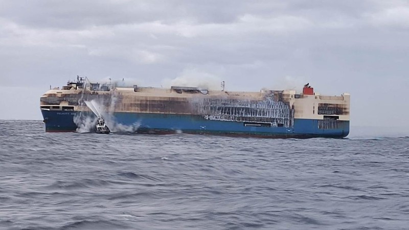 The ship, Felicity Ace, which was traveling from Emden, Germany, where Volkswagen has a factory, to Davisville, in the U.S. state of Rhode Island, burns more than 100 km from the Azores islands, Portugal, February 18, 2022. Portuguese Navy (Marinha Portuguesa)/Handout via REUTERS THIS IMAGE HAS BEEN SUPPLIED BY A THIRD PARTY.