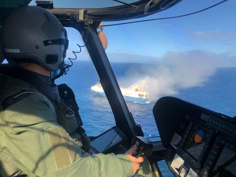 The ship, Felicity Ace, which was traveling from Emden, Germany, where Volkswagen has a factory, to Davisville, in the U.S. state of Rhode Island, burns more than 100 km from the Azores islands, Portugal, February 18, 2022. Portuguese Navy (Marinha Portuguesa)/Handout via REUTERS THIS IMAGE HAS BEEN SUPPLIED BY A THIRD PARTY.