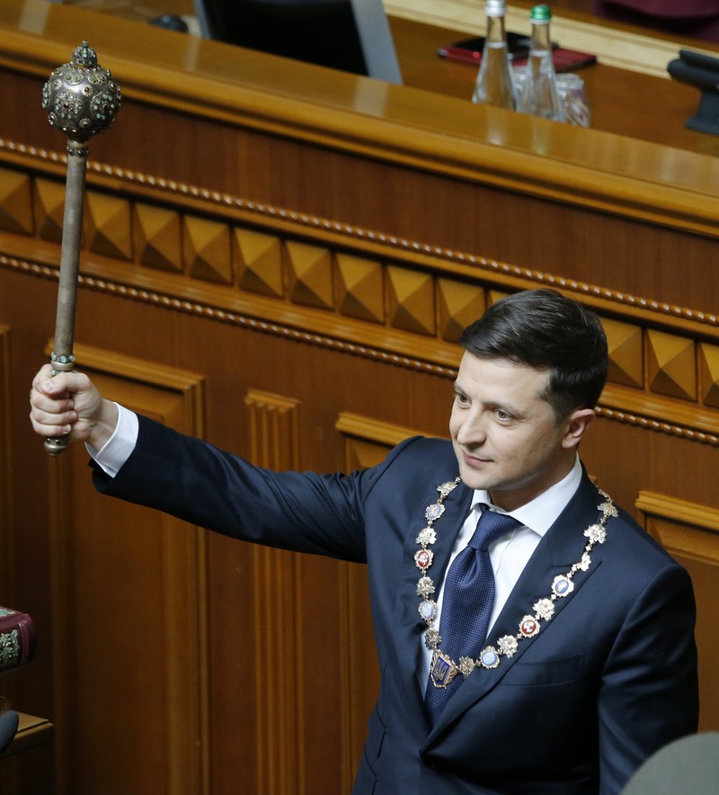 FILE - In this Friday, March 29, 2019 file photo, Volodymyr Zelenskiy, Ukrainian actor and candidate in the upcoming presidential election, hosts a comedy show at a concert hall in Brovary, Ukraine. For his presidential campaign popular Ukrainian comedian Volodymyr Zelenskiy has literally taken the script from a TV show in which he plays the Ukrainian president. (AP Photo/Efrem Lukatsky, file)