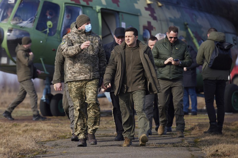 FILE - In this Friday, March 29, 2019 file photo, Volodymyr Zelenskiy, Ukrainian actor and candidate in the upcoming presidential election, hosts a comedy show at a concert hall in Brovary, Ukraine. For his presidential campaign popular Ukrainian comedian Volodymyr Zelenskiy has literally taken the script from a TV show in which he plays the Ukrainian president. (AP Photo/Efrem Lukatsky, file)