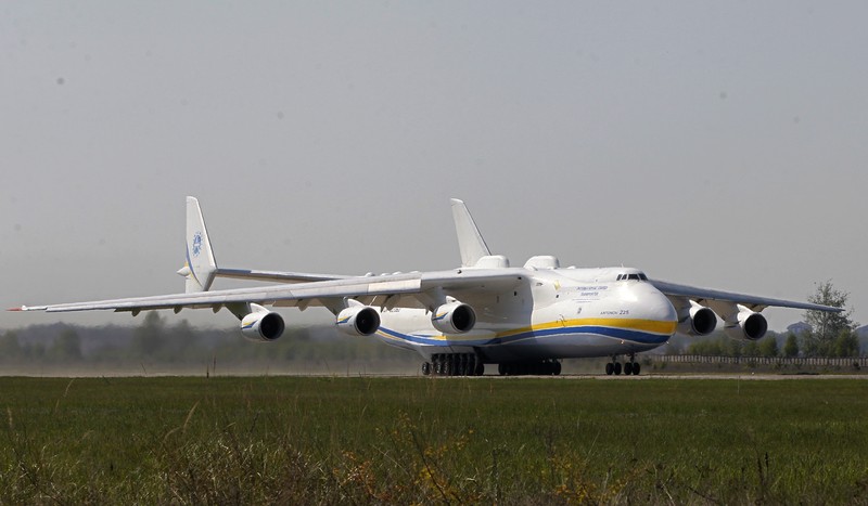 The world's largest airplane, Ukrainian Antonov An-225 Mriya takes off at the  airport  near Hostomel near Kiev , Ukraine, Tuesday, May 10, 2016. The An-225 departed its home base at  Hostomel and flew to Prague, Czech Republic, where it will be loaded with the massive 130-tonne generator and will fly onto Perth, Australia.  (AP Photo/Sergei Chuzavkov)