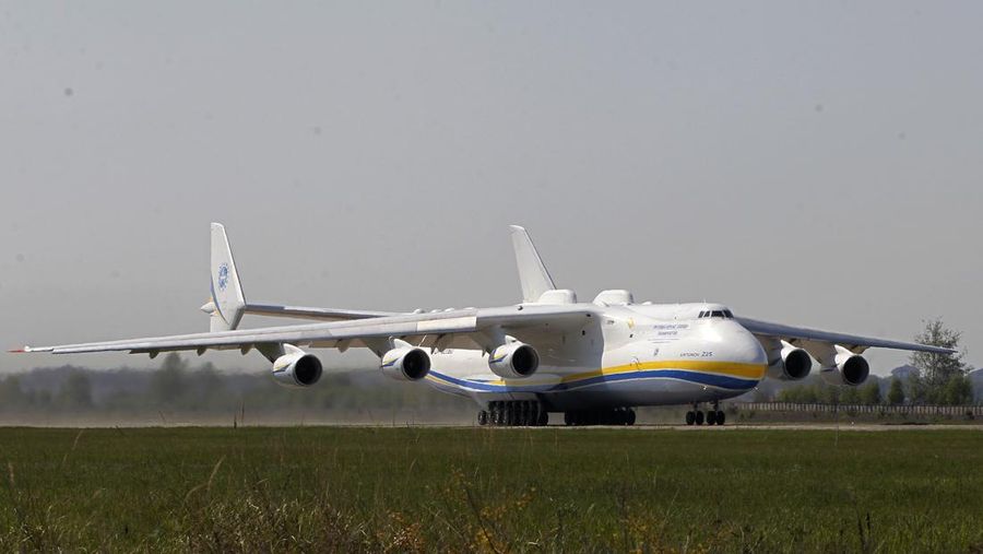 The world's largest airplane, Ukrainian Antonov An-225 Mriya takes off at the  airport  near Hostomel near Kiev , Ukraine, Tuesday, May 10, 2016. The An-225 departed its home base at  Hostomel and flew to Prague, Czech Republic, where it will be loaded with the massive 130-tonne generator and will fly onto Perth, Australia.  (AP Photo/Sergei Chuzavkov)
