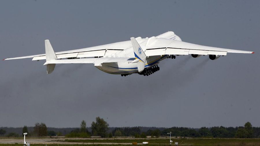 The world's largest airplane, Ukrainian Antonov An-225 Mriya takes off at the  airport  near Hostomel near Kiev , Ukraine, Tuesday, May 10, 2016. The An-225 departed its home base at  Hostomel and flew to Prague, Czech Republic, where it will be loaded with the massive 130-tonne generator and will fly onto Perth, Australia.  (AP Photo/Sergei Chuzavkov)